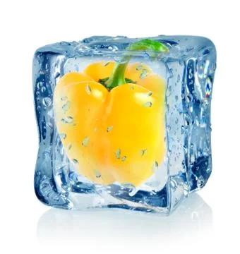 Ice cube and pepper Stock Photos