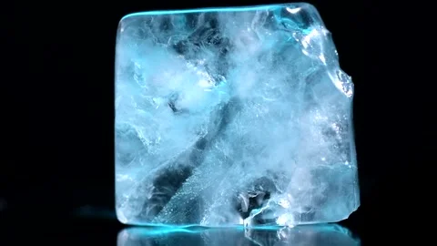 Ice cube on black background, Abstract natural ice texture. Freezy ice structure Stock Footage 343895161