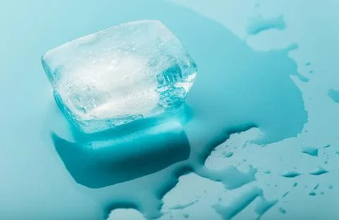 Ice cube close-up melting Stock Photos