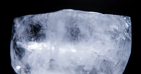 Ice cube closeup over black background. 스톡 동영상 333018835