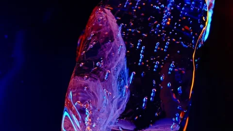 Ice cube on color fire light. abstract wallpaper Stock Footage 278377299