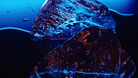 Ice cube on color fire light. abstract wallpaper Stock Footage 278377398