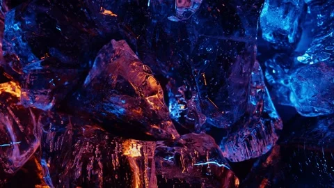 Ice cube on color fire light. abstract wallpaper Stock Footage 279934621