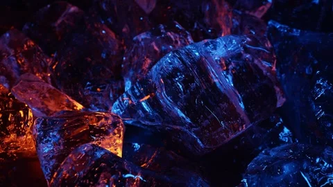 Ice cube on color fire light. abstract wallpaper Stock Footage 282345637