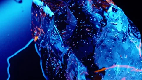 Ice cube on color fire light. abstract wallpaper Stock Footage 282349407