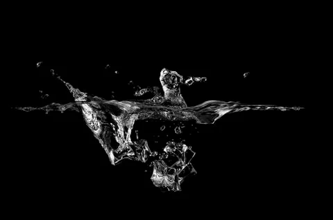 Ice cube falling in water (high-quality digital image) Stock Photos
