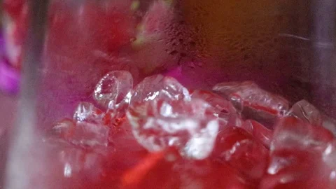 Ice Cube Inside a Strawberry Jar Stock Footage 109698977