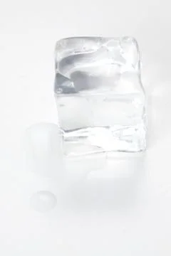 Ice cube isolated Stock Photos