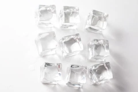 Ice cube isolated Stock Photos