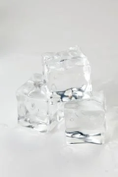 Ice cube isolated Stock Photos