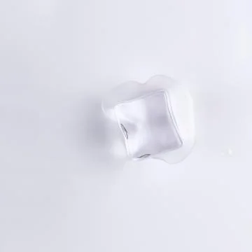Ice cube isolated on white background. Stock Photos