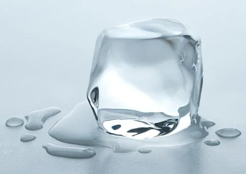 Ice cube. Melting Ice cubes with water drops on a table. Clear ice in cube Stock Photos