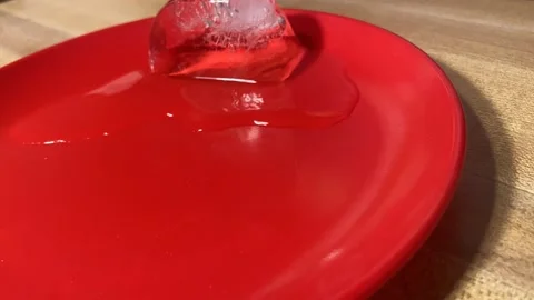 Ice Cube Melting Time Lapse Stock Footage 148453604