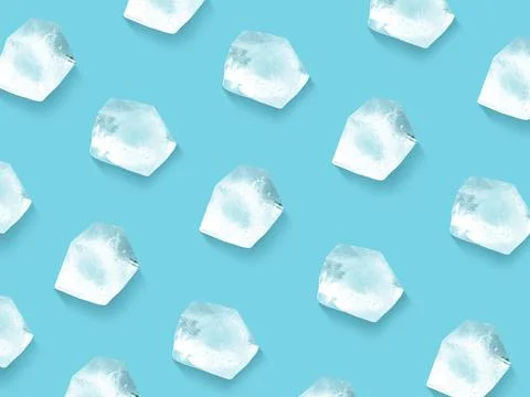 Ice cube pattern on light blue background Stock Photos