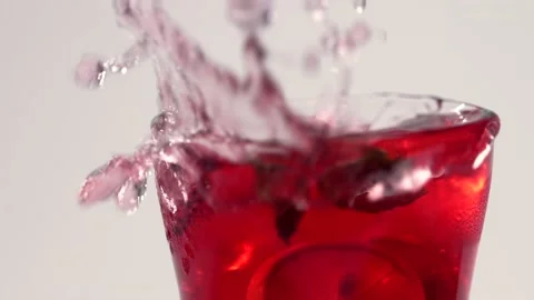 Ice cube splash in glass Stock Footage