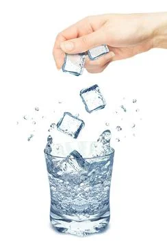 Ice cube splash Stock Photos