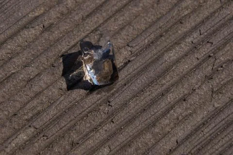 Ice cube in the sun Stock Photos