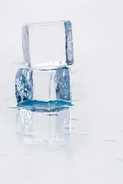 Ice cube on table Stock-Fotos