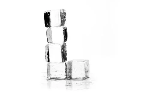 Ice cube on table Stock Photos