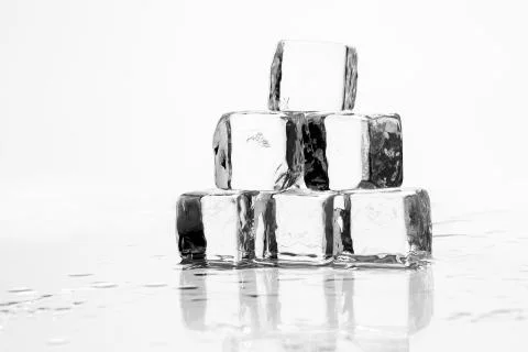 Ice cube on table Foto stock