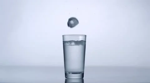 Ice cube in water, Slow Motion Stock Footage 9304132