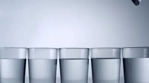 Ice cube in water, Slow Motion Stock Footage 9304269