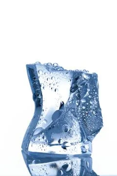 Ice cube on white background Stock Photos