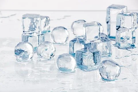 Ice cubes and balls Stock Photos