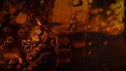 Ice Cubes And Bubbles Inside The Soda Video stock 103840542