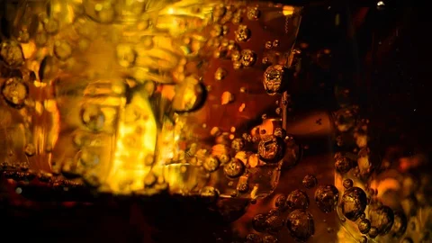Ice Cubes And Bubbles Inside The Soda Video stock 103840987