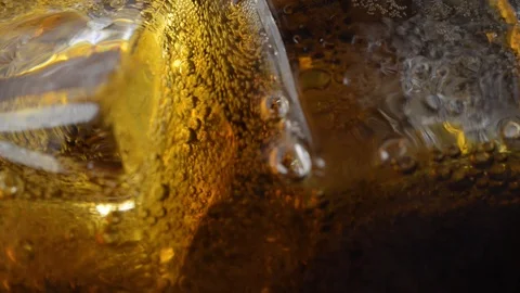 Ice Cubes And Bubbles Inside The Soda Stock Footage 103841306