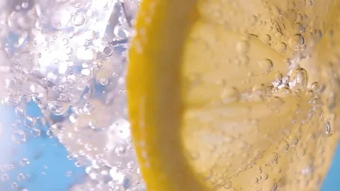 Ice cubes and lemon slice in glass Stock Footage 116099158