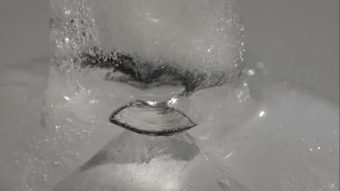 Ice cubes are melting, close-up, time-lapse. Video stock 156935816