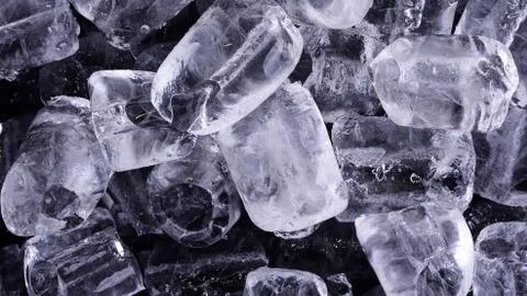 Ice cubes background Stock Photos