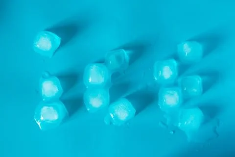 Ice cubes background Stock Photos