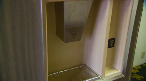 Ice cubes being poured into container Stock-Footage 57815126