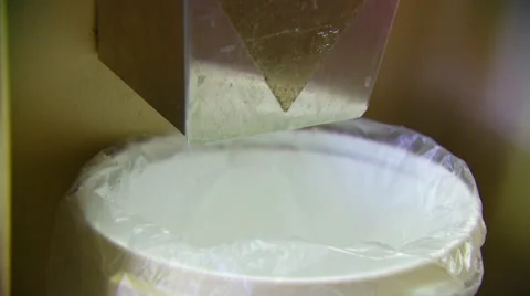 Ice cubes being poured into container Stock-Footage 57815264