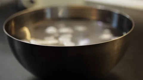Ice cubes in the bowl Stock Footage 97410894
