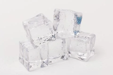 Ice cubes in close-up on gray background Foto stock