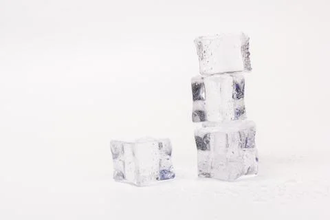 Ice cubes in close-up on gray background 스톡 사진