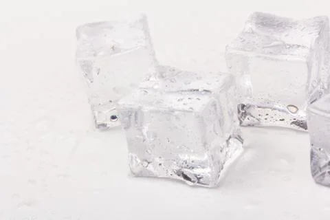 Ice cubes in close-up on gray background Foto stock