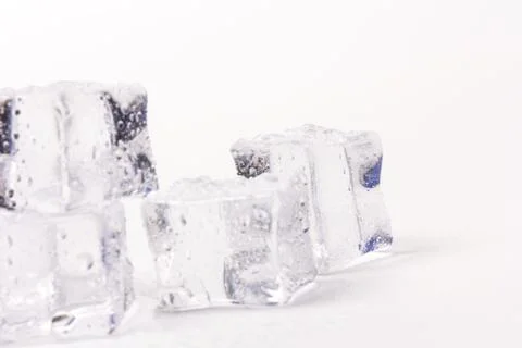 Ice cubes in close-up on gray background Foto stock