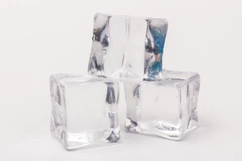 Ice cubes in close-up on gray background Foto stock