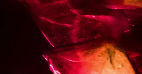 Ice cubes in cola whisky macro shot background abstract Stock Footage 124793488