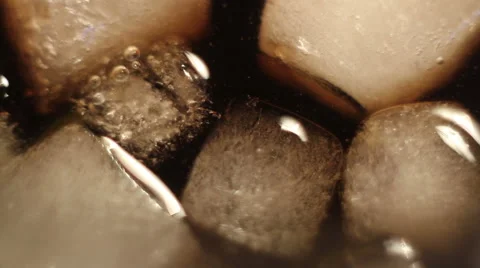 Ice cubes in a dark air bubbles Stock Footage 60252129