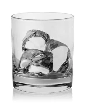 Ice cubes in an empty round glass Stock Photos