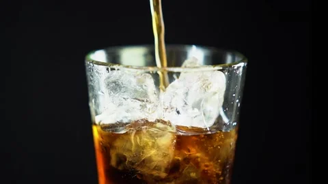 Ice cubes fall into the glass Stock Footage 157310562