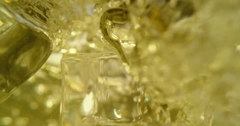 Ice cubes falling into beer Stock Footage 311827032