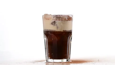 Ice Cubes Falling Into Cold Coffee Video stock 133627717