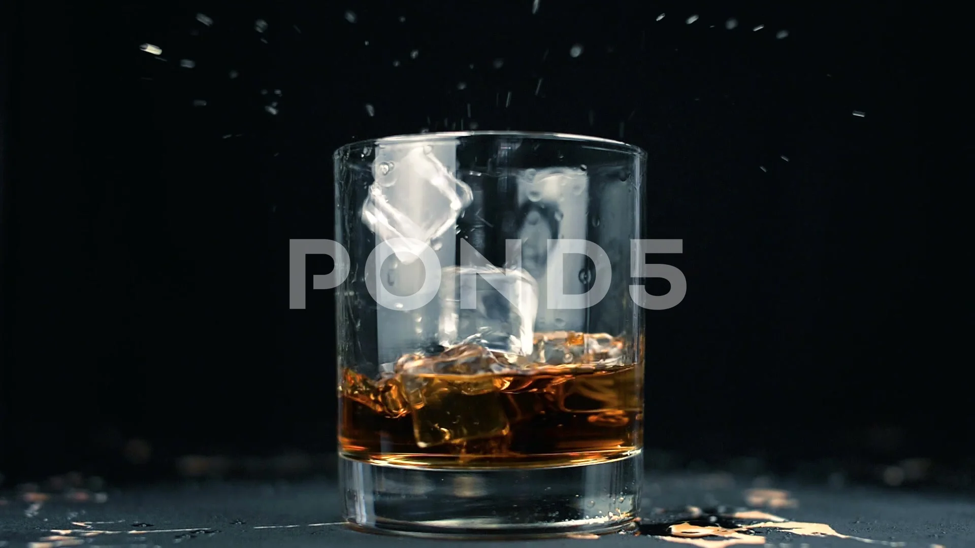 https://images.pond5.com/ice-cubes-falling-glass-whiskey-footage-099179525_prevstill.jpeg